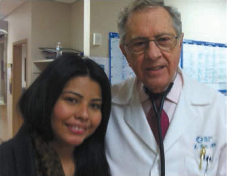 Ana standing by Dr Laraia from BVMI